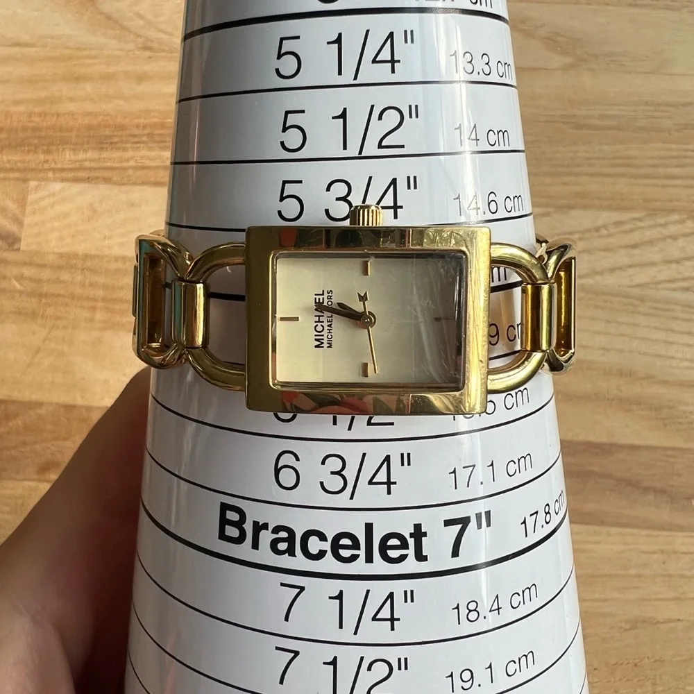Michael Kors ladies rectangular gold tone bracelet dress watch NEW BATTERY